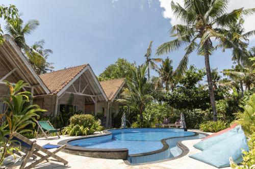 Πισίνα στο ή κοντά στο Coconut Village Guest House Lembongan RedPartner