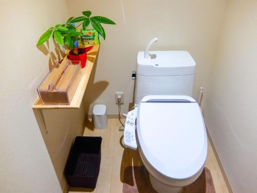 Kylpyhuone majoituspaikassa Guesthouse Bell Fushimi