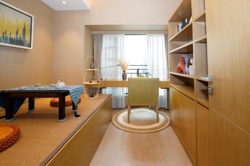 Posezení v ubytování CM Serviced Apartment