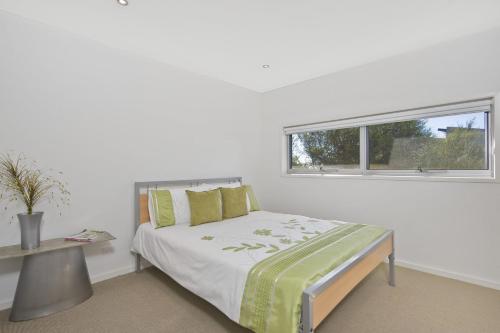 Ένα ή περισσότερα κρεβάτια σε δωμάτιο στο The Lookout - BYO Linen