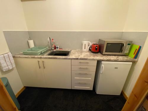 A cozinha ou kitchenette de Enegar Accommodation