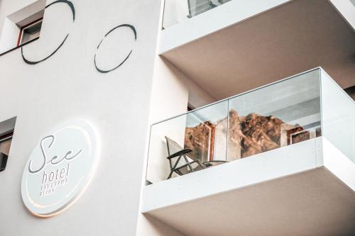 a building with a sign that says see hotel at Seehotel Panorama Relax in Resia