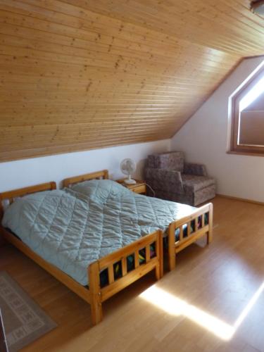 Tempat tidur dalam kamar di House Elisabeth Balaton