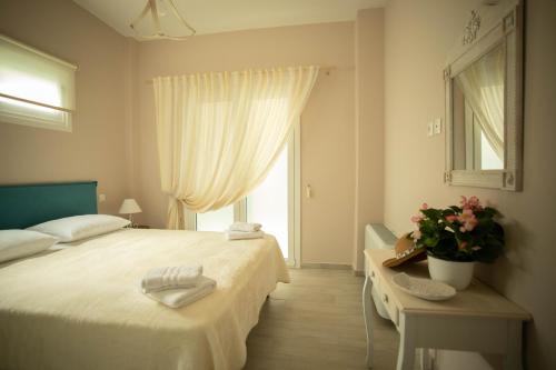 Кровать или кровати в номере SantaCara City Apartment