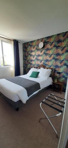 Postel nebo postele na pokoji v ubytování Hotel La Belle Etoile