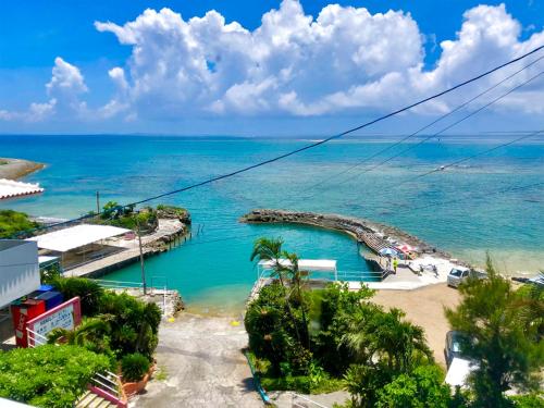 a view of the ocean from a resort at Azama Ocean View Terrace in Azama