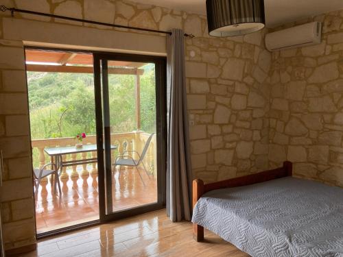 Postel nebo postele na pokoji v ubytování ANEMOS residence