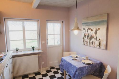 Η κουζίνα ή μικρή κουζίνα στο Ferienhaus Lüttes Landhuus
