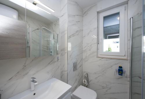 Kúpeľňa v ubytovaní Apartman Eni
