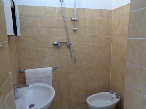 Koupelna v ubytování Hotel Gazza