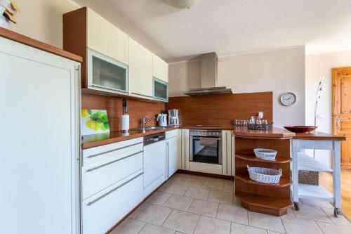 Kuchyň nebo kuchyňský kout v ubytování Denkerhof Ferienwohnung Deichblick