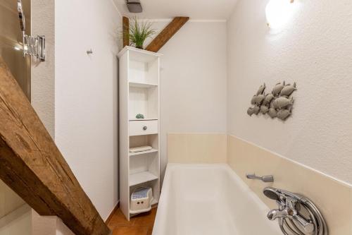 Koupelna v ubytování Denkerhof Ferienwohnung Deichblick