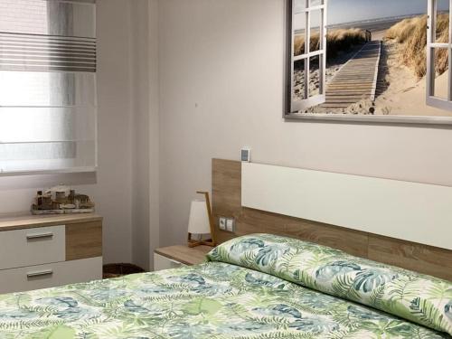 Postel nebo postele na pokoji v ubytování Bajo en primera línea de playa