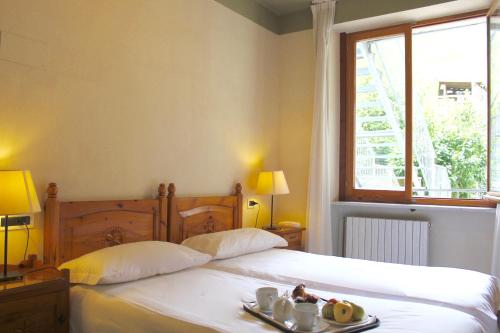 Postel nebo postele na pokoji v ubytování Hotel Miramonti Family & SPA