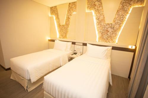 Кровать или кровати в номере Best Western Batang Garing
