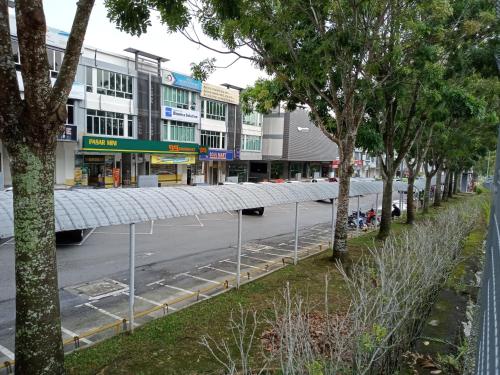 a view of a street with a white roof at AVENUE BANGI HOTEL in Kajang