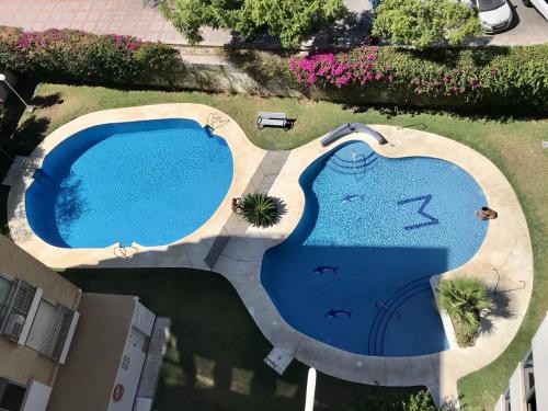 Bazén v ubytovaní Deluxe Penthouse Fuengirola alebo v jeho blízkosti