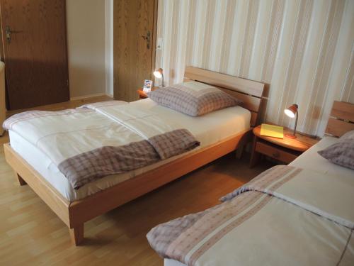 A bed or beds in a room at Ferienwohnung Eleonore Sauter