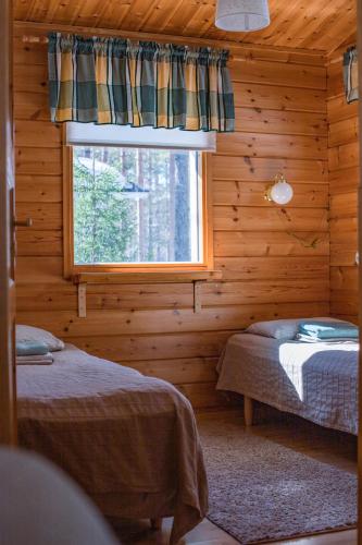 En eller flere senge i et værelse på Petäjäkylä