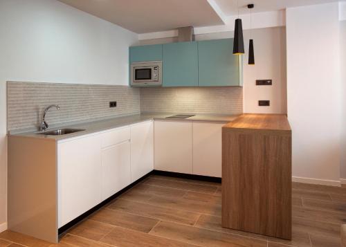 Η κουζίνα ή μικρή κουζίνα στο Apartamentos La Espadaña