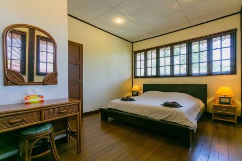 En eller flere senge i et værelse på Elysia Nongsa 57 Batam Luxury Villa
