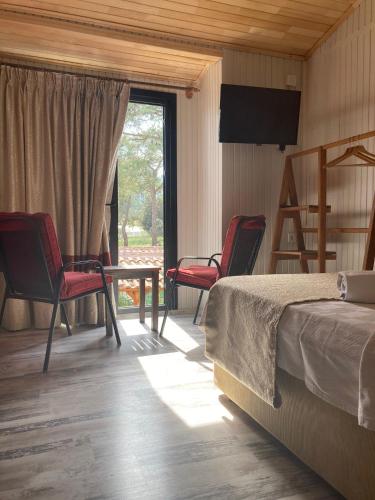 Кровать или кровати в номере Koala Bungalows