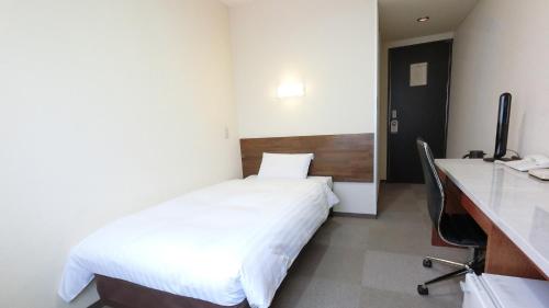 Postel nebo postele na pokoji v ubytování Honjo Grand Hotel Vacation STAY 35741