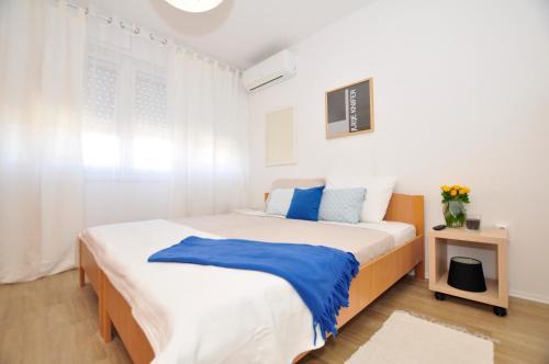 Posteľ alebo postele v izbe v ubytovaní Room & Studio In the Centre