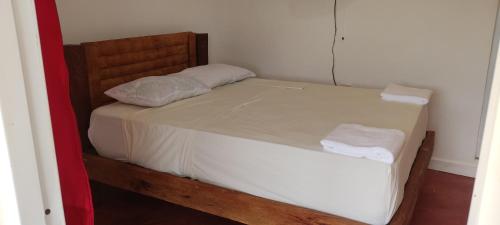 Katil atau katil-katil dalam bilik di rancho durian hotel y restaurante
