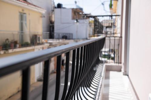 a balcony with a view of a city street at Lithies Zante Living in Zakynthos Town