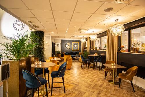 ห้องอาหารหรือที่รับประทานอาหารของ Clarion Collection Hotel Grand Bodø