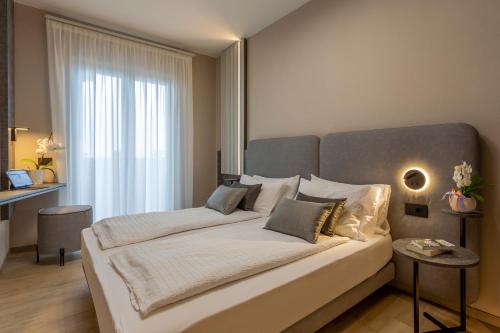 Hotel Veronesiにあるベッド