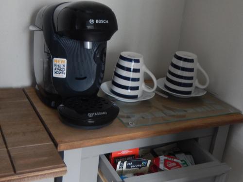 Kemudahan buat kopi dan teh di The Garfield Guest House
