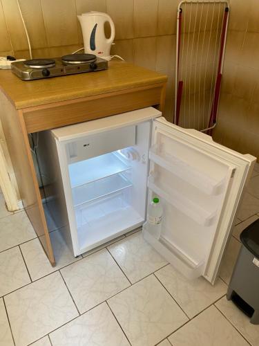 Kuchyň nebo kuchyňský kout v ubytování Logara's Apartments