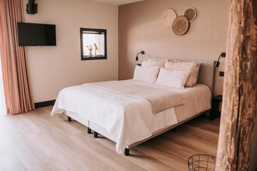 Postel nebo postele na pokoji v ubytování Bed and Breakfast de WoerdT