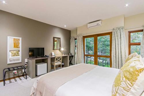 Ένα ή περισσότερα κρεβάτια σε δωμάτιο στο Dunton Guest House