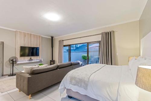 Ένα ή περισσότερα κρεβάτια σε δωμάτιο στο Dunton Guest House