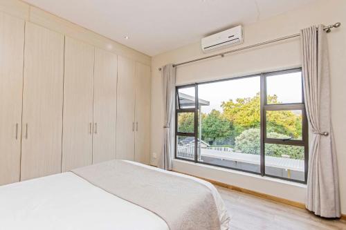 Ένα ή περισσότερα κρεβάτια σε δωμάτιο στο Dunton Guest House