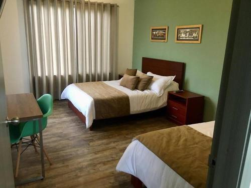 Un pat sau paturi într-o cameră la CASA VACACIONAL CAPINA87