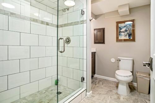a bathroom with a shower and a toilet at Villa's of Aspen by Snowmass Vacations in Aspen