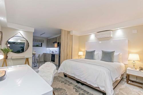Ένα ή περισσότερα κρεβάτια σε δωμάτιο στο Dunton Guest House