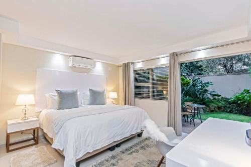 Ένα ή περισσότερα κρεβάτια σε δωμάτιο στο Dunton Guest House