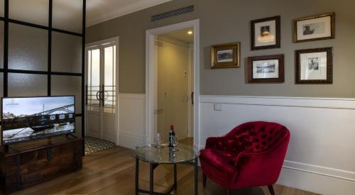 Télévision ou salle de divertissement dans l'établissement Porto A.S. 1829 Hotel