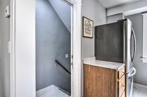 a small bathroom with a shower and a sink at Dog-Friendly Home about 14 Mi to Highmark Stadium in Cheektowaga