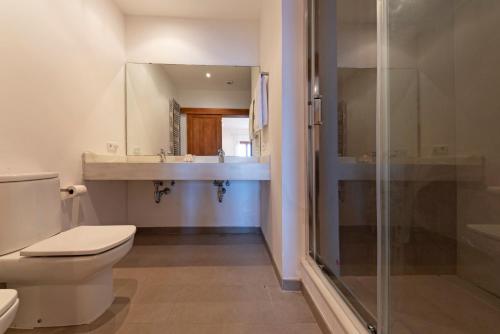 Ванная комната в Chalet en primera línea de mar con amplia terraza