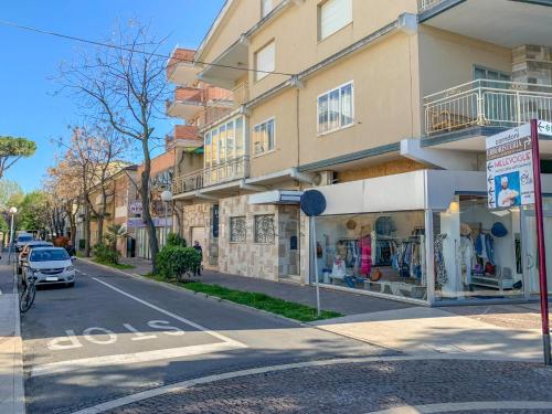 a building with a store on the side of a street at Apartment Bellavista-4 by Interhome in Cattolica