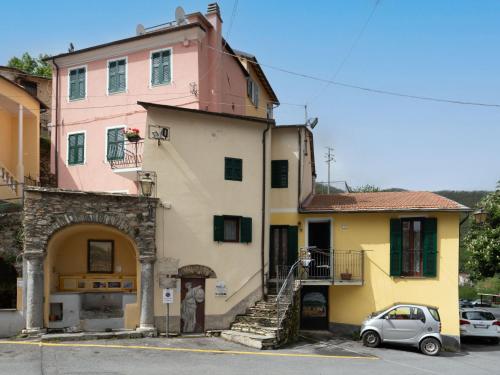 a small car parked in front of a building at Holiday Home Ca' da Ciassa - VLO130 by Interhome in Valloria