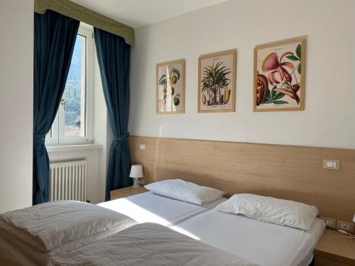 Кровать или кровати в номере Appartamenti Baia Azzurra 3.