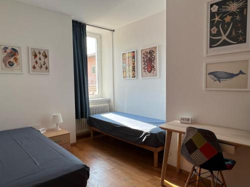 Postel nebo postele na pokoji v ubytování Apartments Baia Azzurra 1