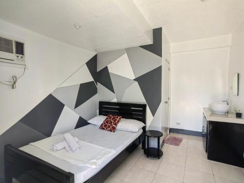 Postel nebo postele na pokoji v ubytování AA TRAVELLERS PAD
